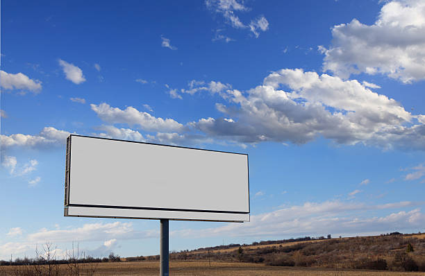 istock Vacant billboard and clouds in sky 465698800