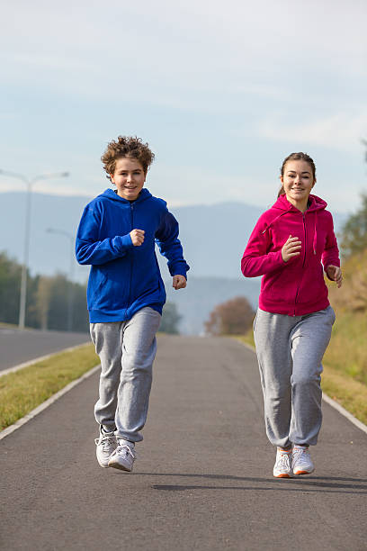 istock Young people running outdoor 465699368