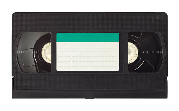 Video cassette Old video cassette with empty label isolated on white background audio cassette blank vcr film reel stock pictures, royalty-free photos & images