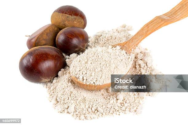 Chestnut Flour In A Wooden Spoon Isolated On White Stock Photo - Download Image Now - Chestnut - Food, Flour, 2015
