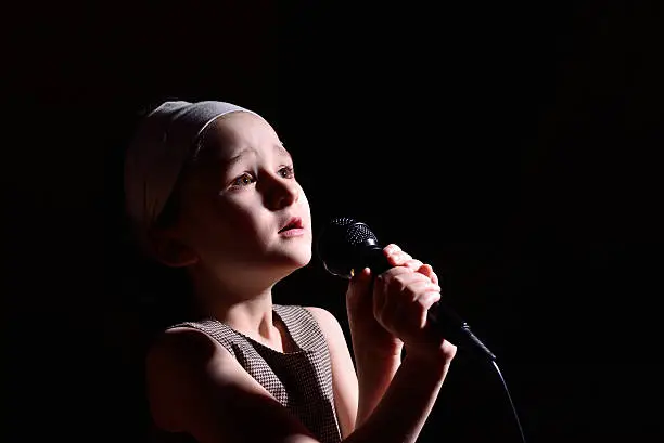 Photo of Little girl singing