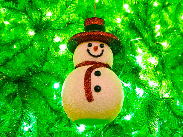 istock Snowman on the Christmas tree. 465703125