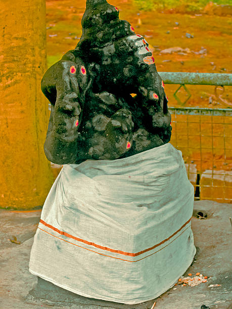 istock The god gajanana in stone 465703192