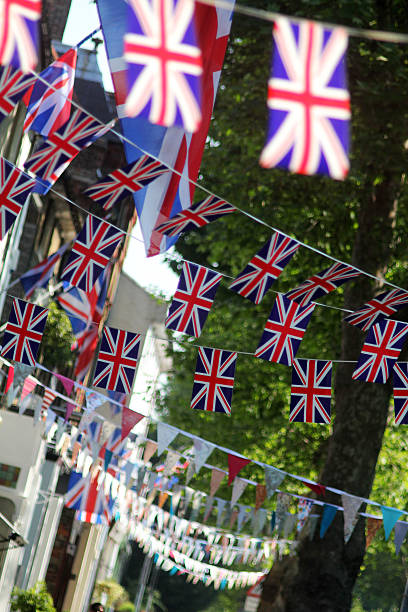 celebration - british flag bunting flag english culture - fotografias e filmes do acervo