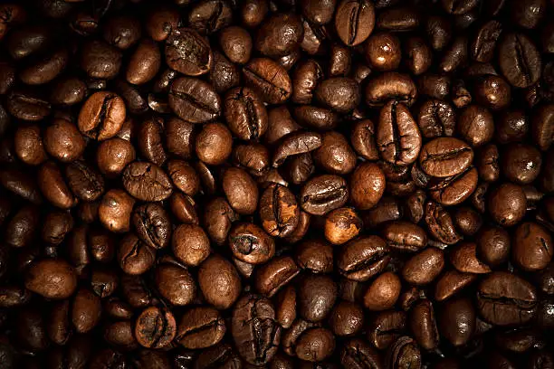 A background of freshly roasted coffee beans