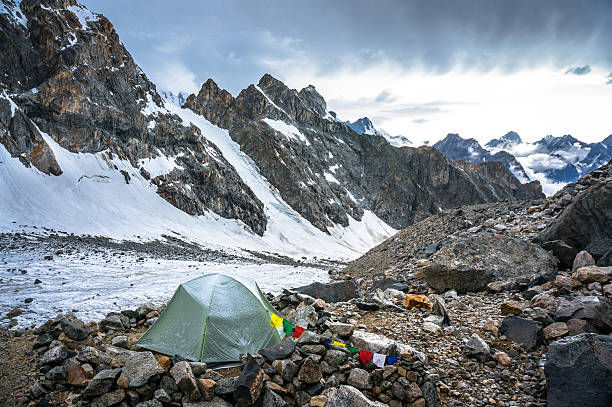 istock lonely camp in the high snowy mountains 465707274