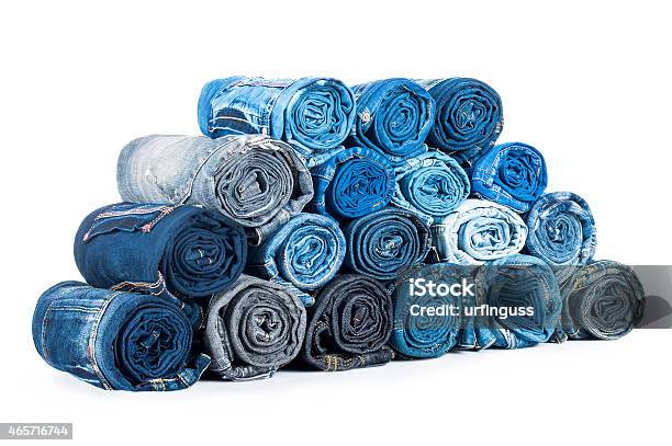 Rolled Jeanses Isolated On A White Background Stock Photo - Download Image Now - 2015, Black Color, Blue