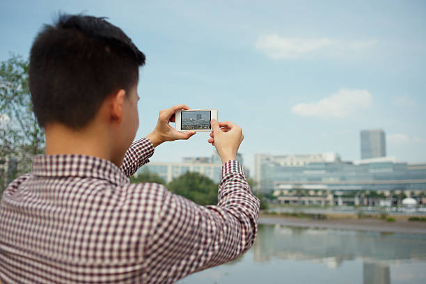 istock Taking picture of the cityscape 465719766