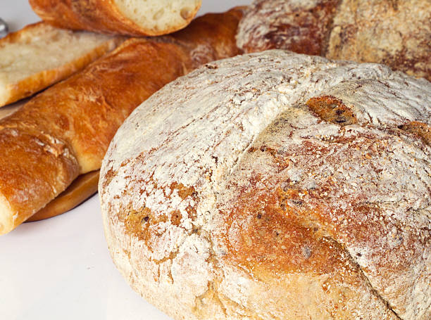 istock Loaf of Rye Bread and Baguette Background 465724566