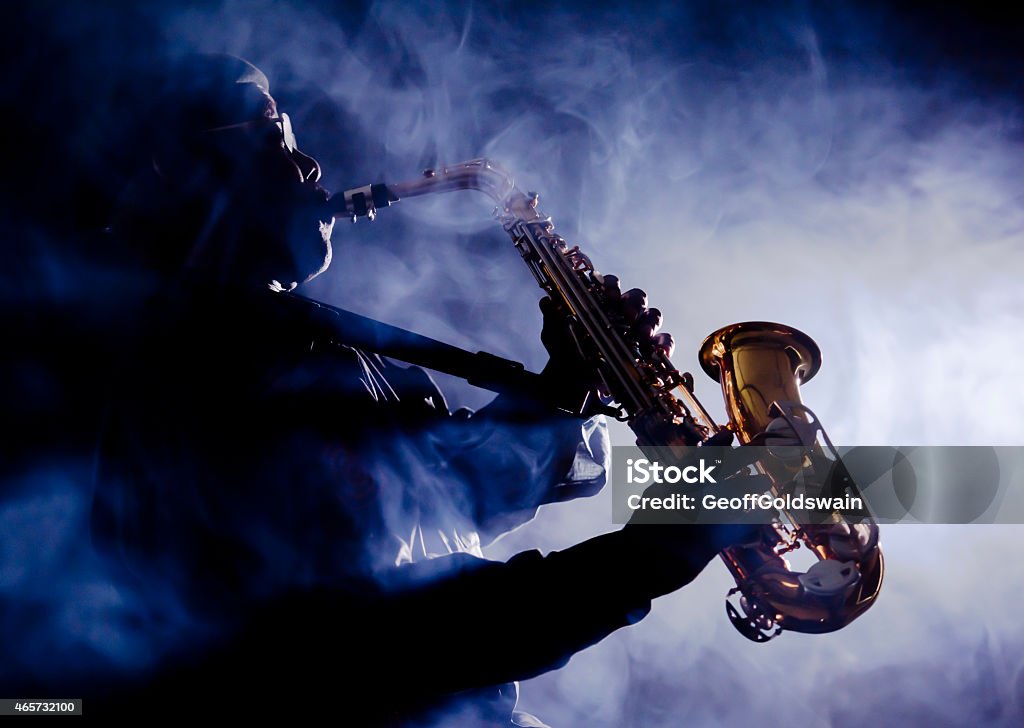 African jazz musician playing the saxophone African jazz musician playing the saxophoneAfrican jazz musician playing the saxophone Jazz Music Stock Photo