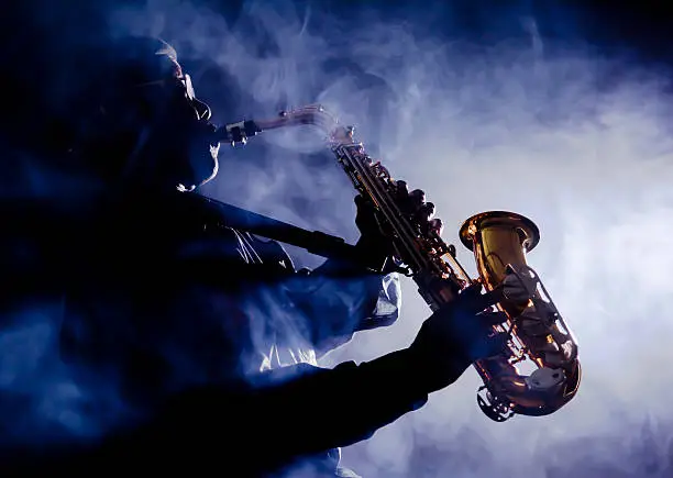 Photo of African jazz musician playing the saxophone