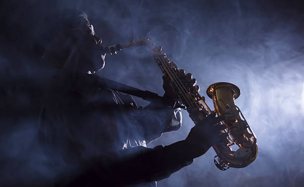 istock African jazz musician playing the saxophone 465732102