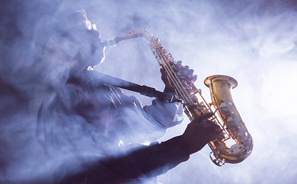 African jazz musician playing the saxophone stock photo