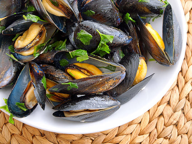 istock Mussels with butter and fresh herbs 465743459