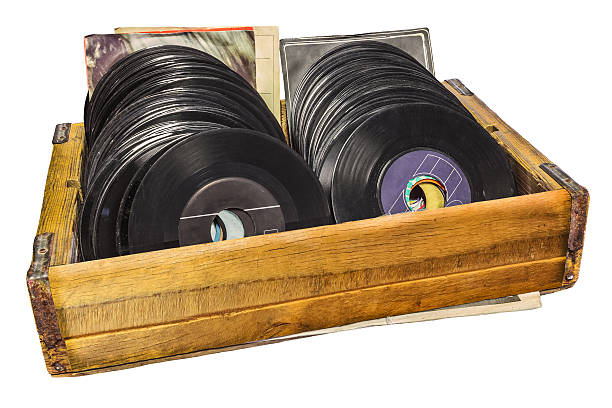 Athens, Greece - April 24, 2015: Old faded vinyl records pop and rock music vintage album sleeves background.