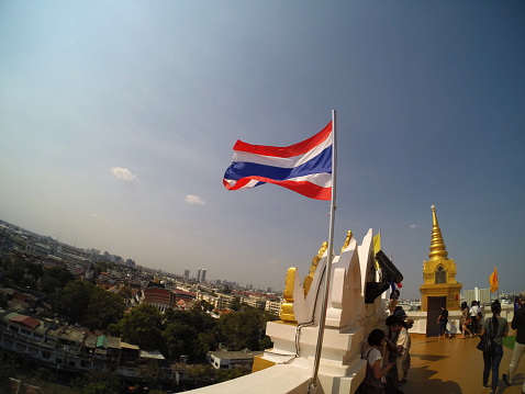 Bangkok, Thailand - February 3, 2015: Golden Palace Stupa, Bangkok. Tourists are enjoying temple and the view. Photo taken with GoPro Hero 3+ Black Edition. 