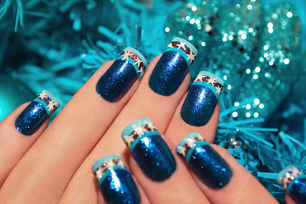 istock Beautiful winter blue manicure. 465754217