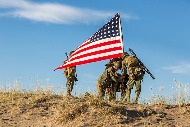 istock WW2 Soldiers Raising the Flag 465755736