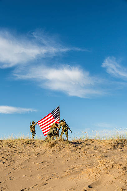 istock WW2 Soldiers Raising the Flag 465755744