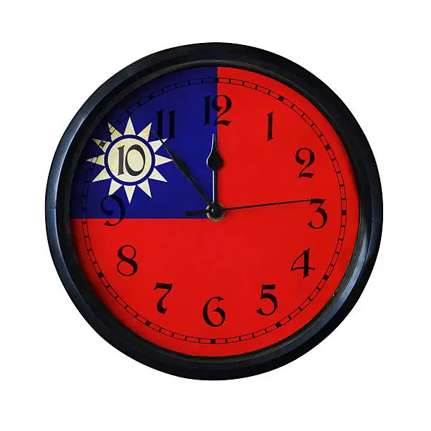 An old Republic-of-China flag wall clock with grungy background - isolated over white.