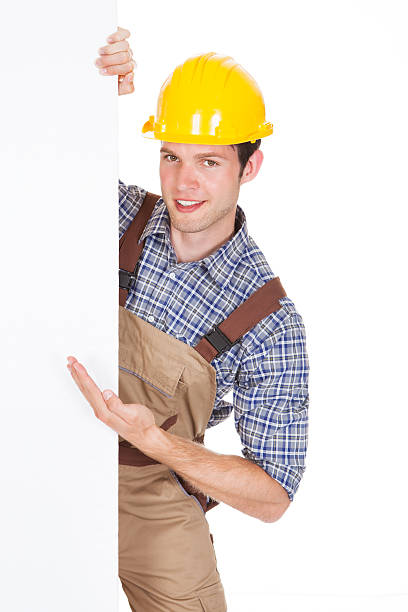 istock Male Worker Holding Blank Placard 465758375