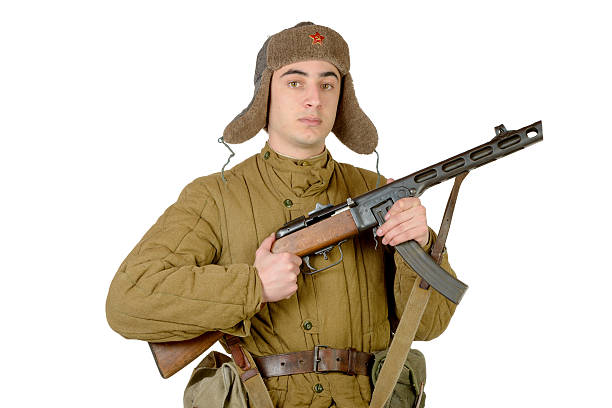 istock young Soviet soldier with machine gun ppsh-41 465759334