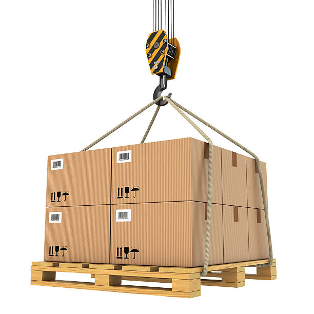istock A large pallet with cardboard boxes being lifted by a crane 465759685