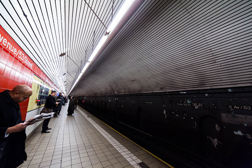 London, United Kingdom - March 17, 2023: A moving train at a London Underground station.