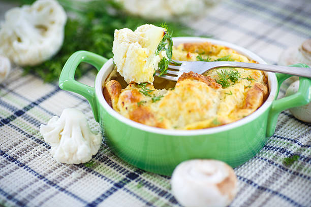 cauliflower baked with egg and cheese stock photo