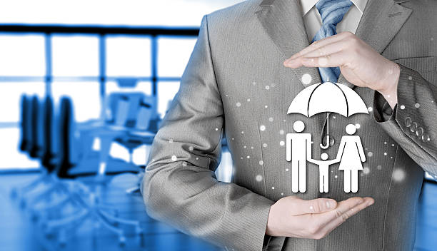 istock businessman protecting family Insurance concept 465766122