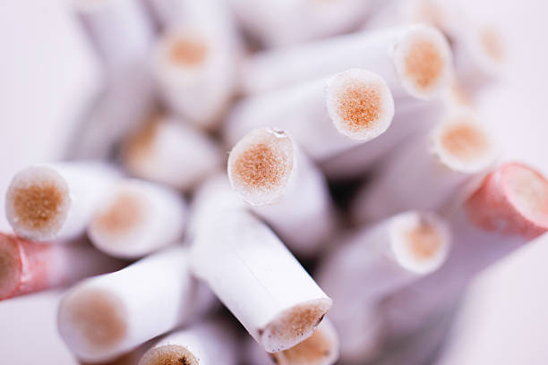 istock dirty ashtray with cigarette ash and butts 465769618