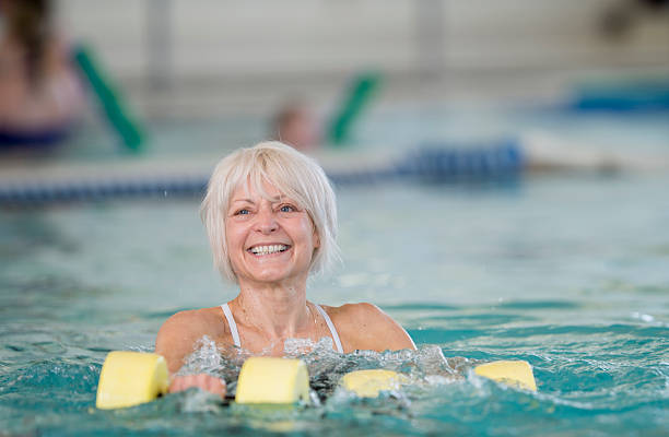 istock Female Senior Water Aerobics 465778196