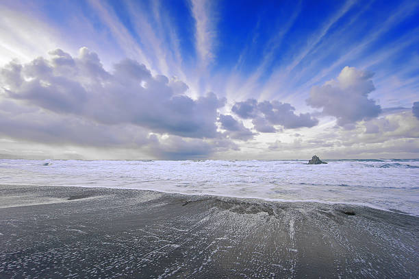 Beach in Sopelana with airplane trails Beach in Sopelana with airplane trails on sky sopelana stock pictures, royalty-free photos & images