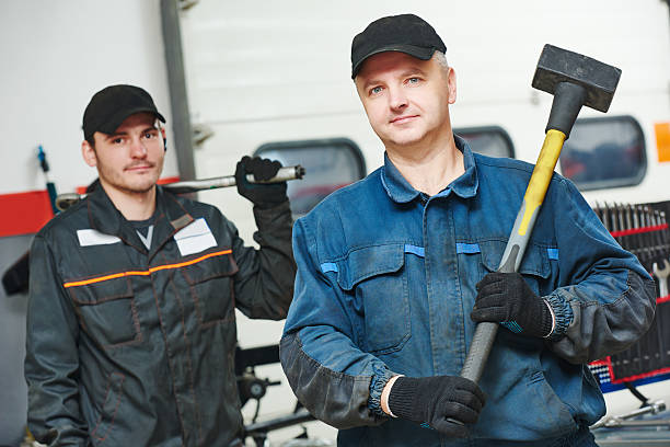 istock two auto mechanic repairmans 465787834