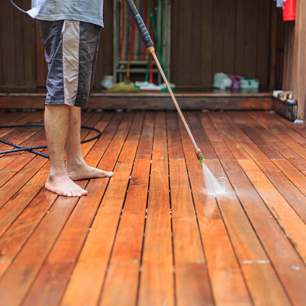 istock Thai man do a pressure washing on timber 465788282