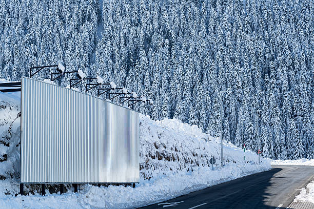 istock Big metal sign in a winter scene 465789041