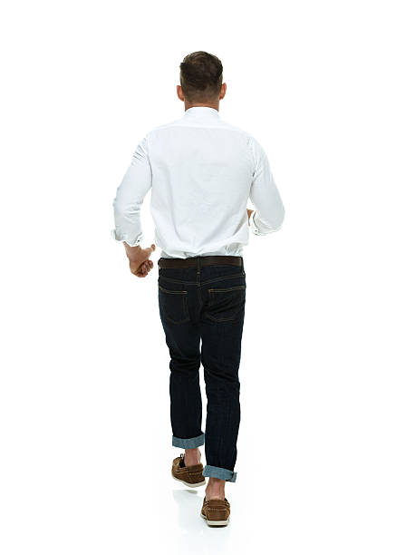 istock Rear view of hipster walking 465792258