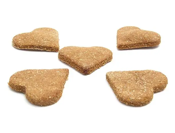 Selfmade christmas-cookies for dogs heart-shaped