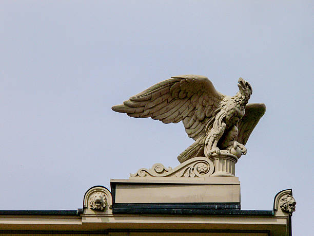 istock stone eagle on rooftop of building Berlin 465810158