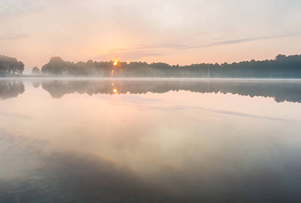 istock Sunrise over summer lake 465810586