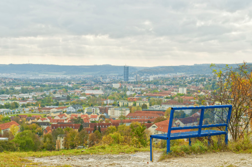 View to the city of Jena with Intershop tower, the typical landmark of university city Jena, Thuringia, Germany. In the foreground \