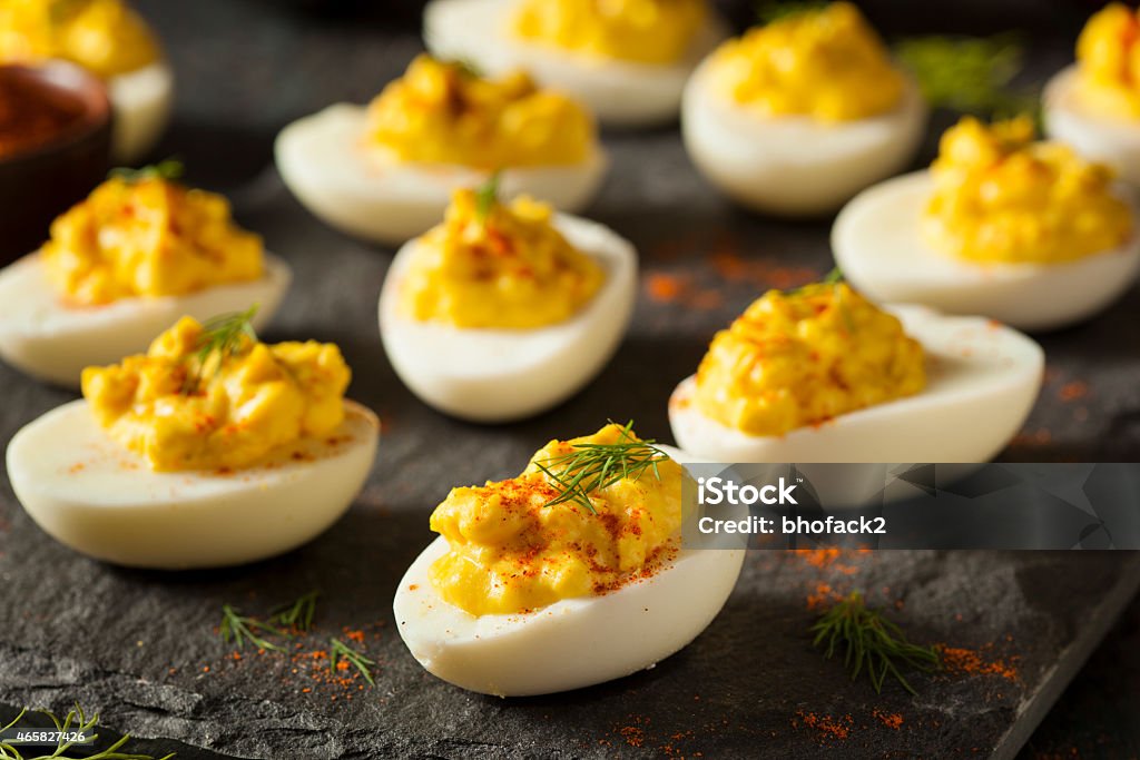 Homemade Spicy Deviled Eggs Homemade Spicy Deviled Eggs with Paprika and Dill Deviled Egg Stock Photo