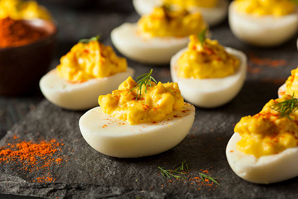 Homemade Spicy Deviled Eggs stock photo