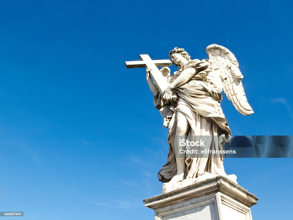 Angel with cross, Sant'Angelo bridge, Rome The historic baroque sculpture of the angel with the cross on the Sant'Angelo bridge in Rome, Italy 2015 Stock Photo