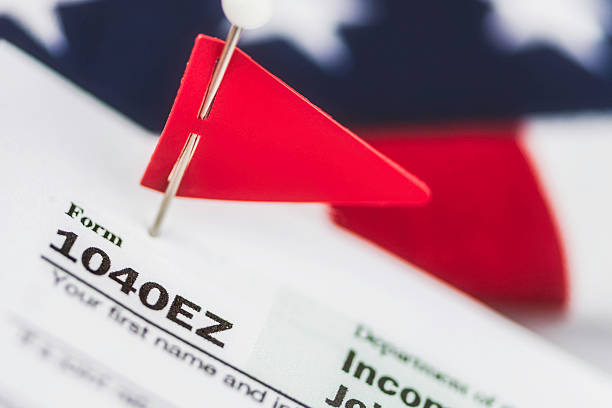 istock Red flag on a US tax form signifying probable audit 465827984