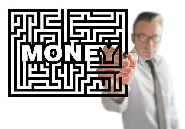 istock Money in Maze 465830444