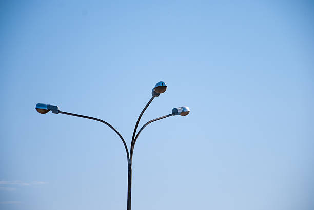 istock Streetlights on a blue sky background 465831708
