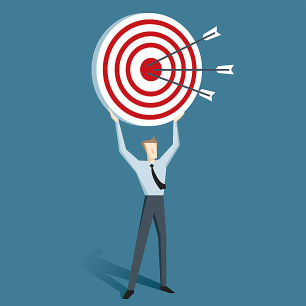 istock Cartoon of man holding up a target with arrows on it 465832263