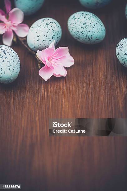 Rustic Easter Background With Speckled Eggs And Blossoms Wood Background Stock Photo - Download Image Now