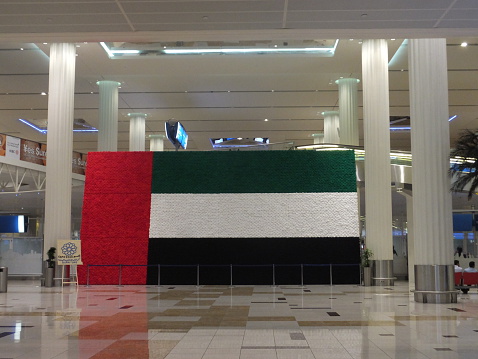 Dubai, UAE - February 1, 2014: The newer Terminal 3 (Emirates) at Dubai International Airport, UAE. It is the single largest building in the world by floor space.